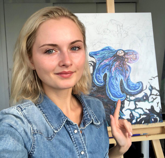 Grateful Diver Artist's Collection by Irina Pushkareva: Caribbean Reef Octopus UV Shirt showing artist working on her painting