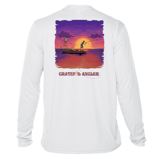 back of white Grateful Angler Skeleton Anglers UV Shirt showing two skeletons on a boat fishing in front of the sunset